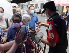 北京玉泉东市场周边社区解除封闭管控 居民正常